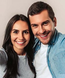 couple taking a selfie after dental appointment